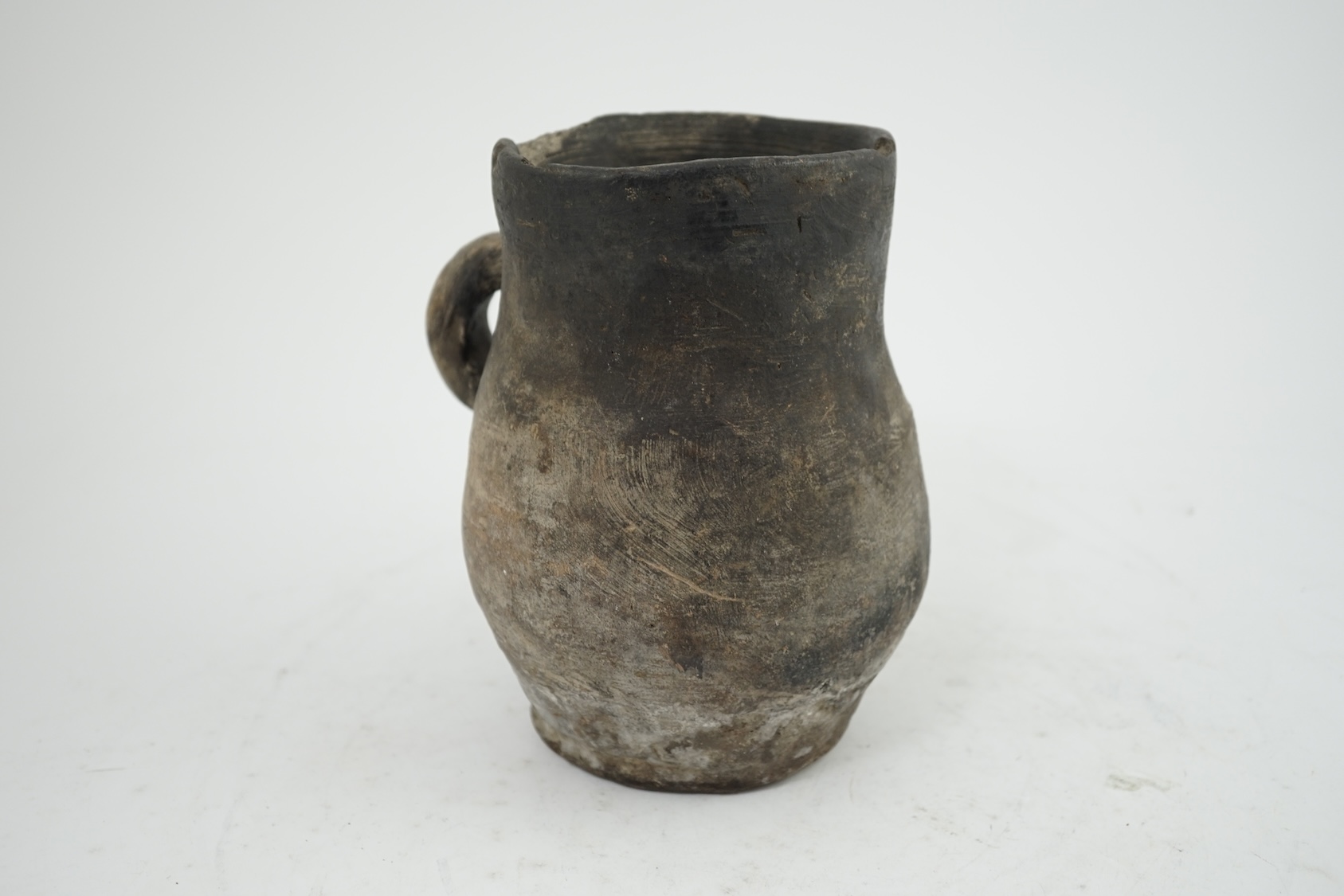 An archaic pottery jug, Iron Age, excavated in Britain